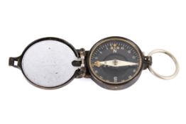 A 1934 German army marching compass. Made by Busch, marked DRGM and numbered 293(?)74, dated 1934.
