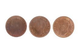 A trio of 1951 one penny coins.