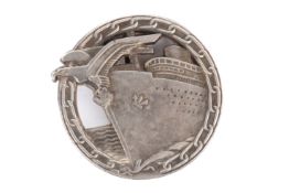 A WWII German Kriegsmarine Blockade Runner badge. Marked Fec. Otto Placzek Berlin Ausf.