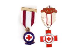 Two British Red Cross enamelled medals. The WWII Proficiency medal marked 03038 M.