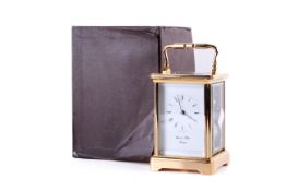 A Contemporary Mowell and Hilton Brass Carriage clock.