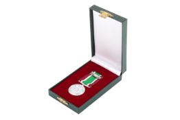 A Women's Voluntary Service medal with ribbon. Unmarked, boxed.