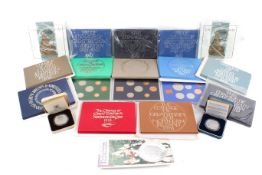 A collection of 12 proof coin sets.