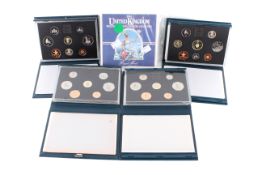 Group of four proof coins sets. Dated 1988, 1990, 1991 & 1994 plus a 1984 B.U. set.
