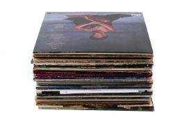 A collection of mostly 1970s and 80s LP vinyl records.