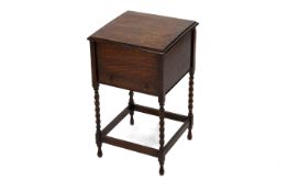 An oak barley twist sewing work box.