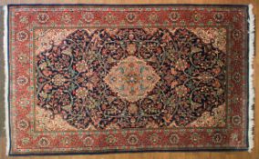 A 'Feraghan' style Persian woollen rug.