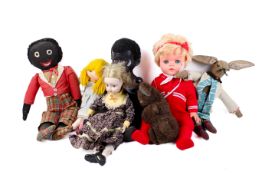 A collection of assorted mid 20th century and later dolls and soft toys.