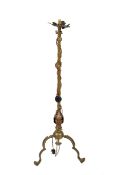 A Benson style brass standard lamp. With copper leaf detail to top and lower.