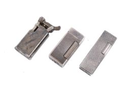 Three vintage lighters.
