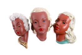 A group of three Goldscheider West German mid-century ceramic wall masks.