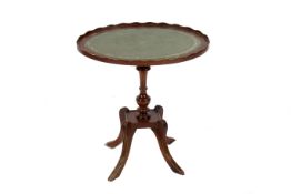 A mahogany side table.