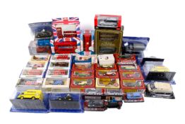 A collection of assorted diecast vehicles. Including Michelin Collection, EFE buses, etc.