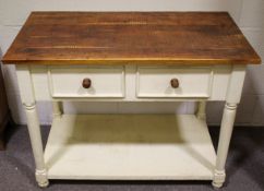 A painted wooden kitchen island unit.