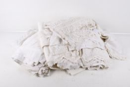 Collection of assorted vintage linen. Including table clothes, etc.