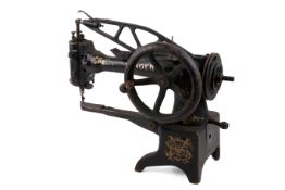 A vintage industrial Singer leather stitching sewing machine.