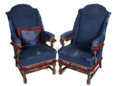 A pair of wingback armchairs.