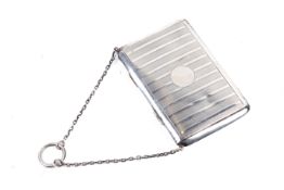 A Lady's sterling silver evening purse. Hallmarked Chester, circa 1990. Measuring 10.