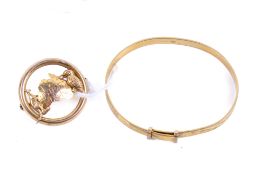 A 9ct gold christening bracelet and an Australian gold brooch.
