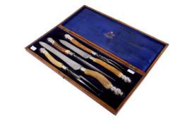 A Mappin & Webb five-piece carving set.