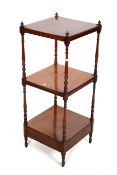 A three tiered mahogany whatnot.