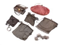 A small collection of Victorian chain mail and other handbags and sewing accessories.