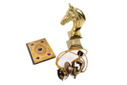 Collection of three assorted brass items.