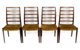 A circa 1960s set of four Niels Moller (Danish 1920 - 1981) model 82 high back ladderback chairs.
