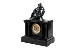 A Victorian black slate mantel clock.