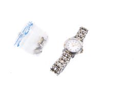 Maurice L ladies stainless steel wristwatch.