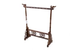 Oriental hardwood brush stand. With carved and pierced decoration.