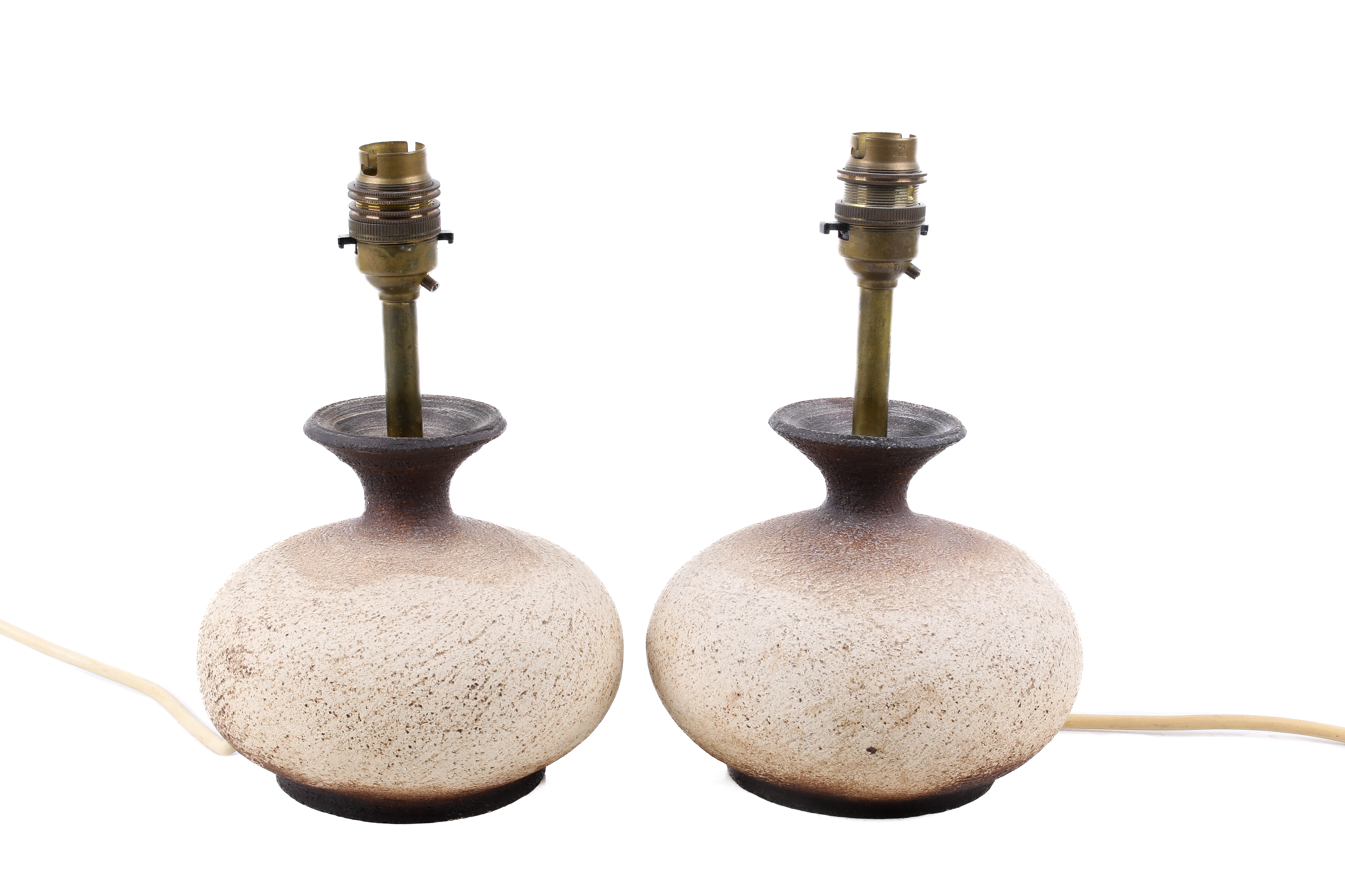 Waistel Cooper (1921 - 2003) a pair of studio art pottery textured table lamps.