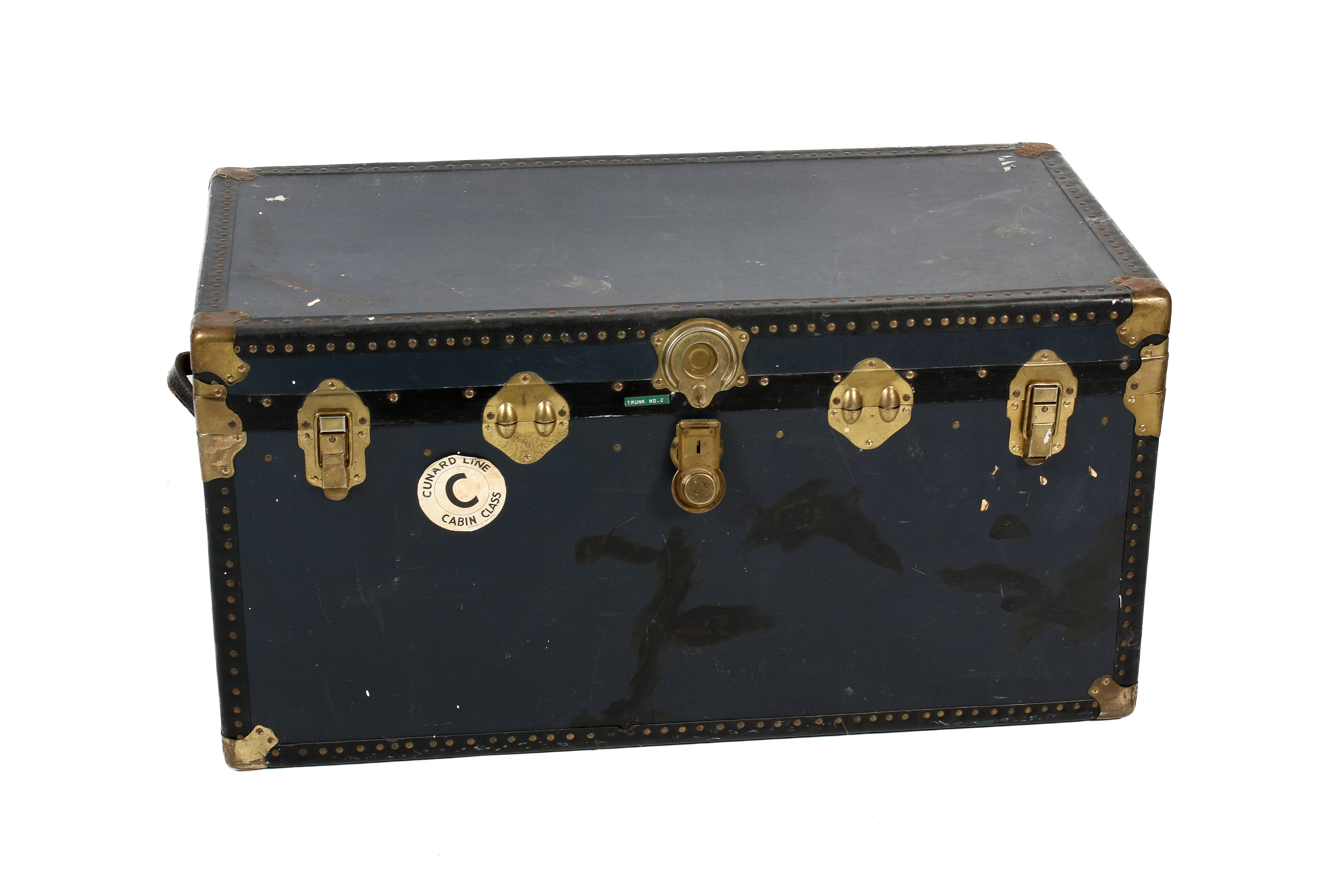 A large blue steamer trunk.