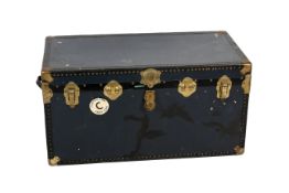 A large blue steamer trunk.