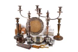 A box of assorted silverplate items. Including candelabra, etc.