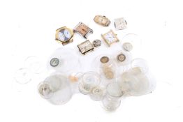 A small group of watch parts.