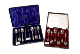 Two sets of early 20th century silver spoons.