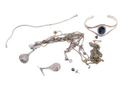 A small group of white metal jewellery. Including a silver bracelet, necklaces, earrings, etc.