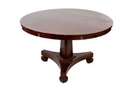 A Victorian rosewood veneer circular breakfast table.