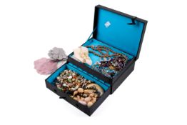 A Chinese pattern jewellery box containing an assortment of costume jewellery