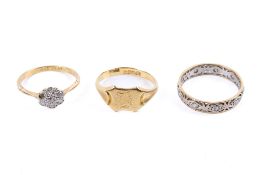 Three gold rings. Two set with small diamonds and one signet ring with shield shaped head. 8.