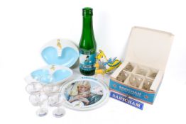 A collection of Babycham items. Include a boxed set of glasses, ashtrays, tray, etc.