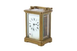 A French brass cased five glass carriage clock. Having white enamel dial with Roman numerals.