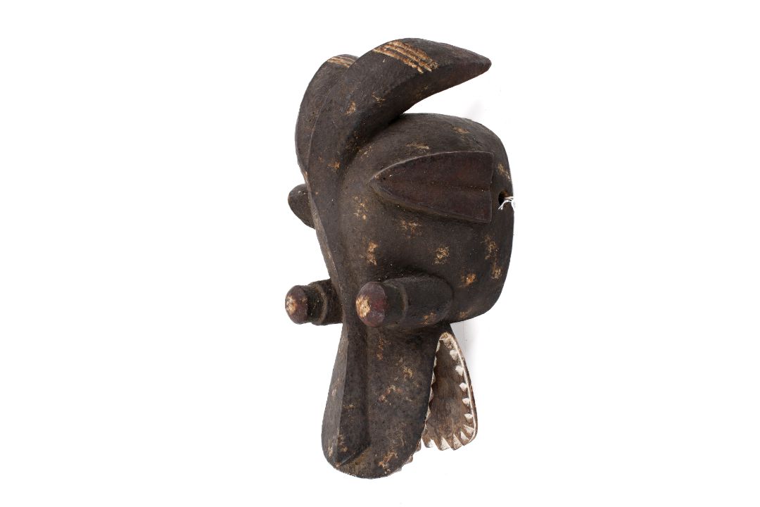 West African tribal carved wood Suaga type mask. With traces of red, white pigment. - Image 1 of 2