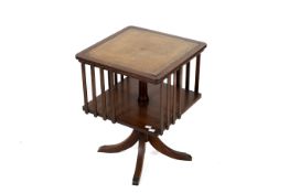 A contemporary mahogany revolving bookcase.
