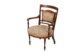 An Edwardian mahogany inlaid bedroom chair.