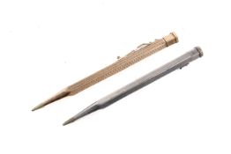 Two vintage propelling pencils.