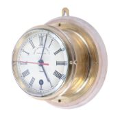 Henry Browne & Son Ltd 'Sestrel' brass ship's timepiece. Roman numerals and a red second hand.
