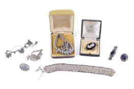 A small group of silver and white metal jewellery.