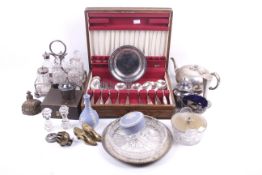 A collection of silverplate and other items, to include a six bottle cruet stand,